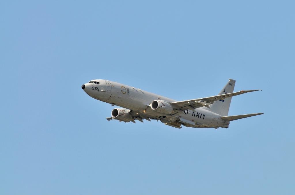 Boeing P-8 with bomb bay open and Harpoon missiles on the wing hardpoints - Credit: Joetey Attariwala